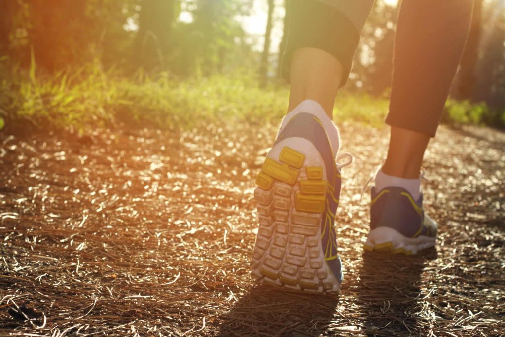 Walking as part of exercising after surgery.